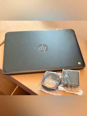 HP Chromebook 11a G6 EE (WiFi) Laptop in Matte Black with Chrome Accent.